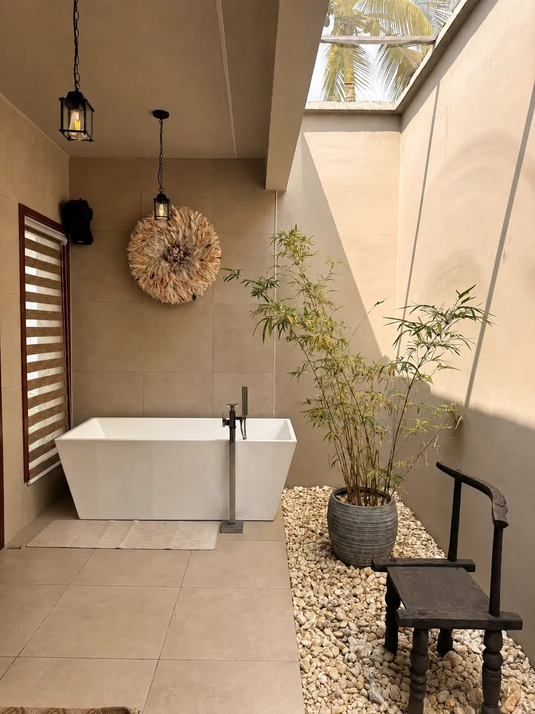 Upgraded spa-style bathroom with skylight, modern fittings and improved ventilation.